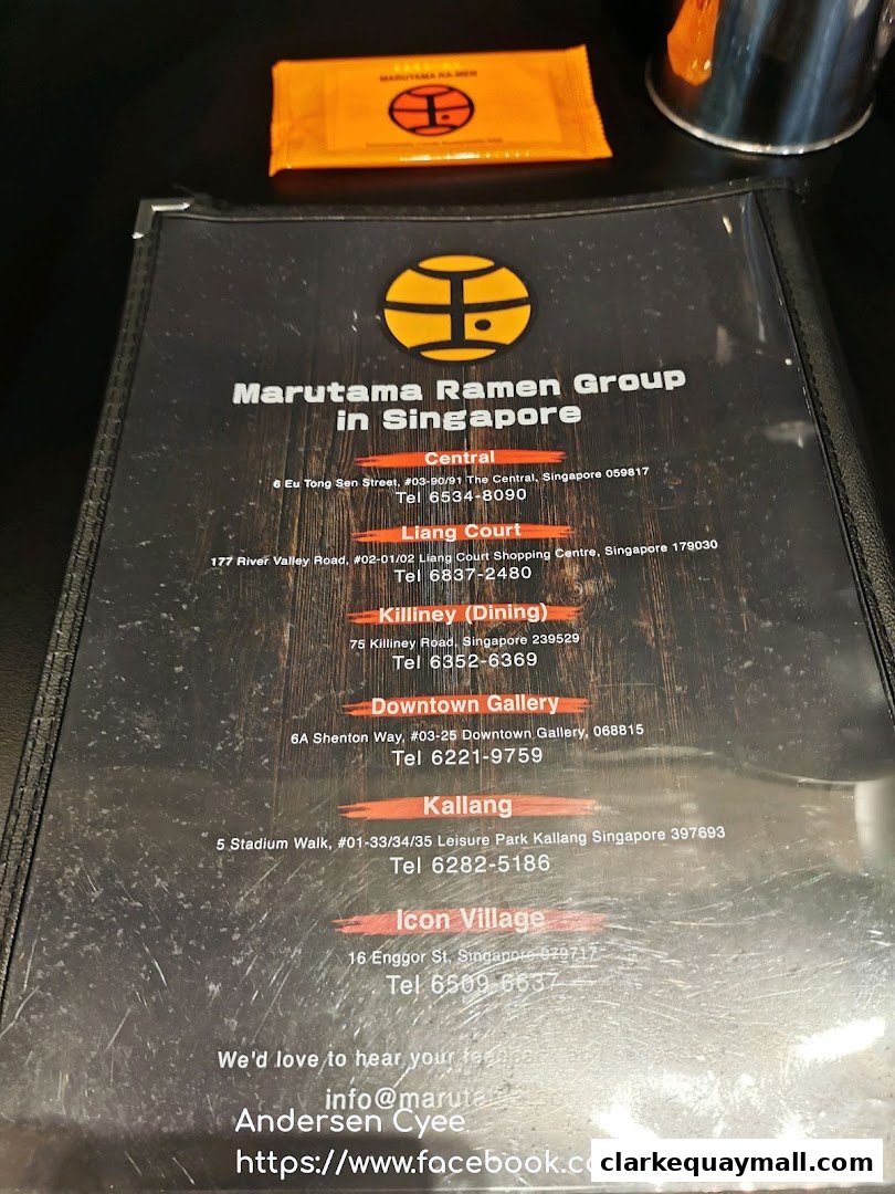 A menu from Marutama Ramen Group in Singapore, listing various locations and contact details.