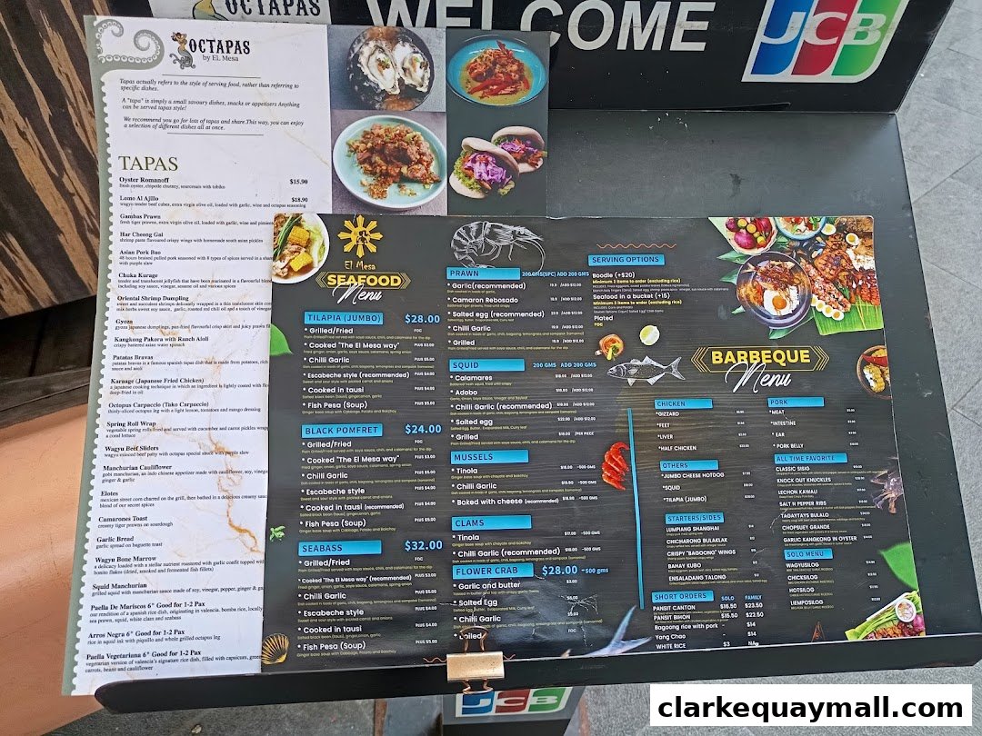 A menu for El Mesa Filipino Seafood Grill featuring seafood, barbeque, and other dishes.