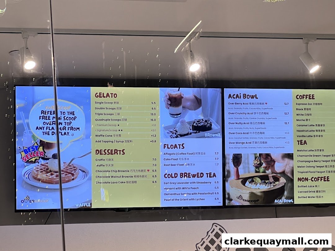 A digital menu board displaying various gelato, acai bowls, coffee, tea, and dessert options.