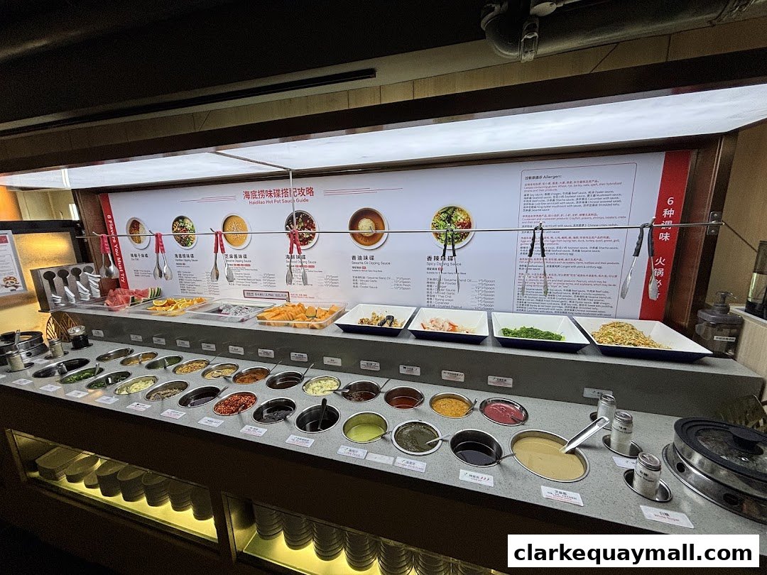 A display of various sauces and ingredients for hot pot at Haidilao.
