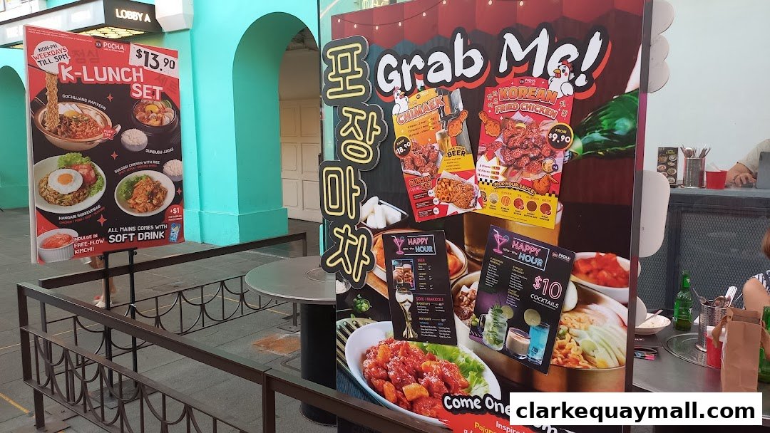 A vibrant display board advertising Korean street food, including fried chicken and lunch sets.