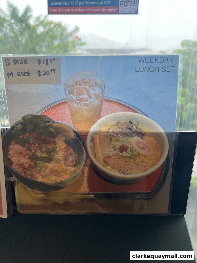 A display of Hokkaido Ramen Santouka's weekday lunch set with ramen and another dish.
