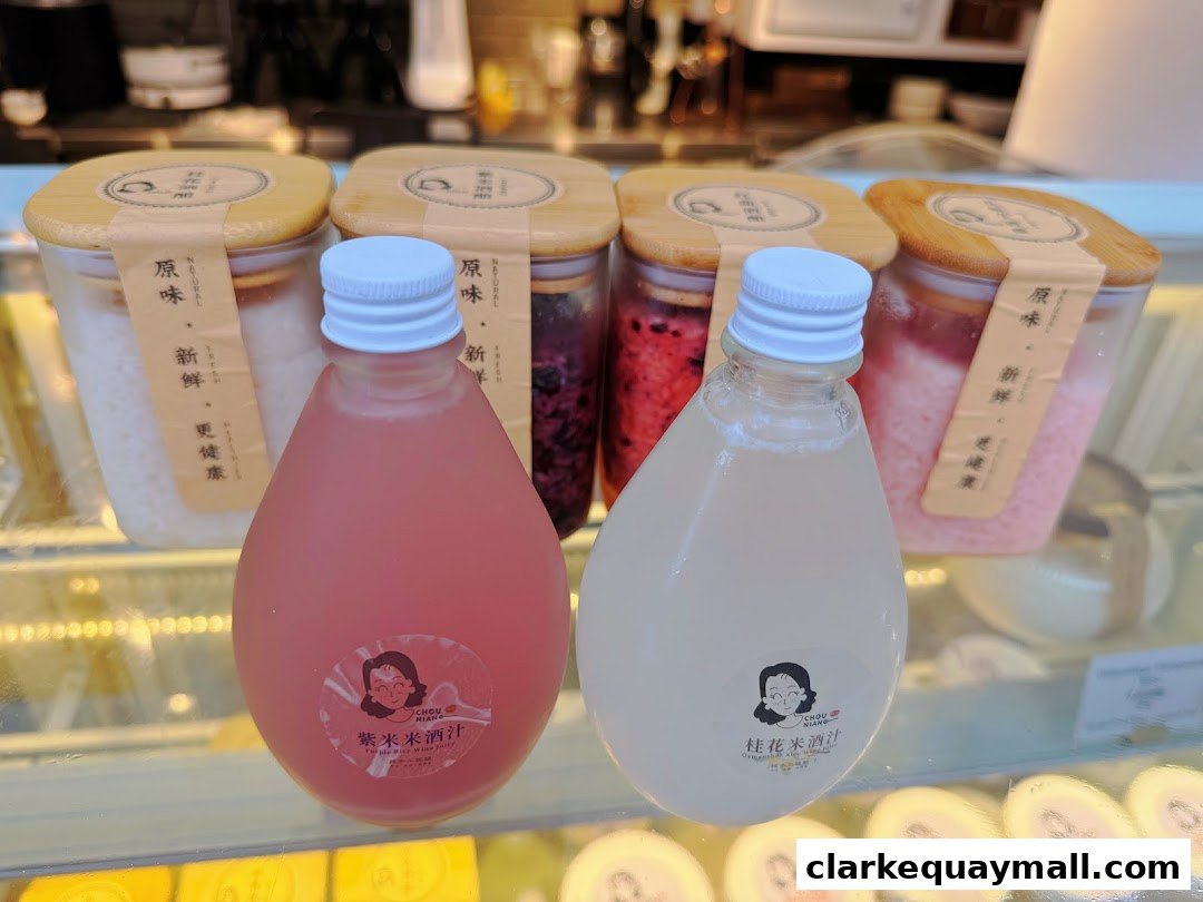 Bottles of fermented rice drinks and jars of fermented rice products displayed in a shop.