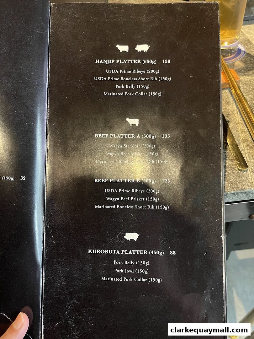 A menu from Hanjip Korean Grill House featuring various meat platters and their ingredients.