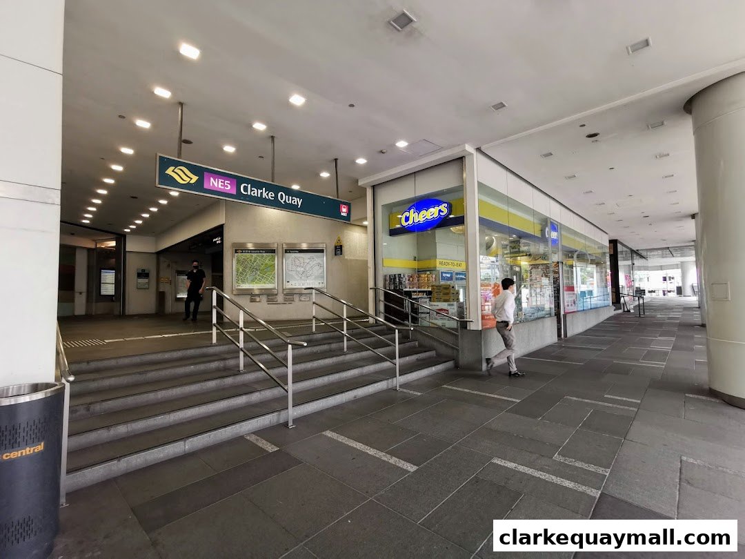 The Cheers convenience store entrance is visible next to the Clarke Quay MRT station entrance.