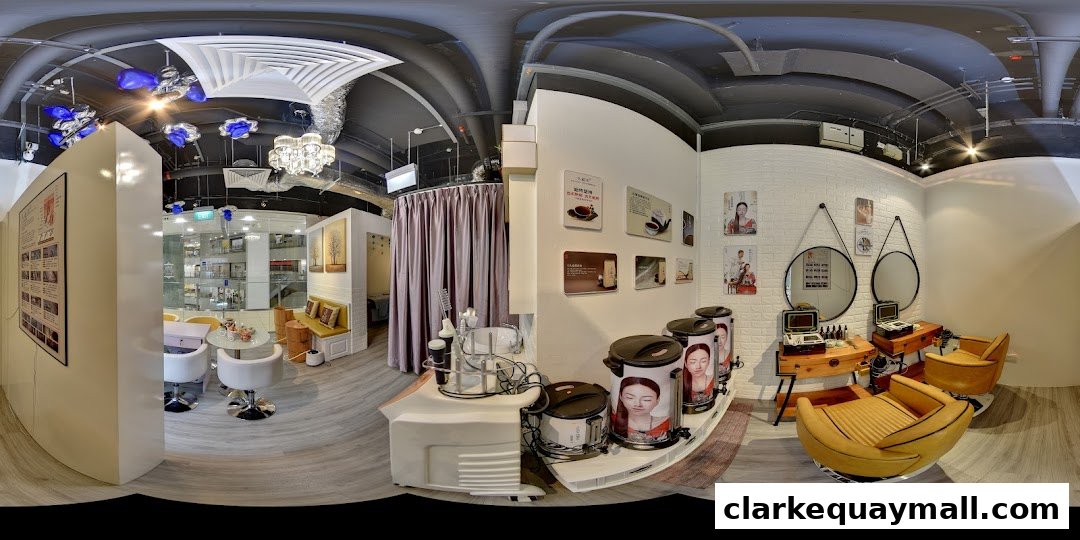 Interior view of a modern wellness and beauty salon with treatment chairs and decor.