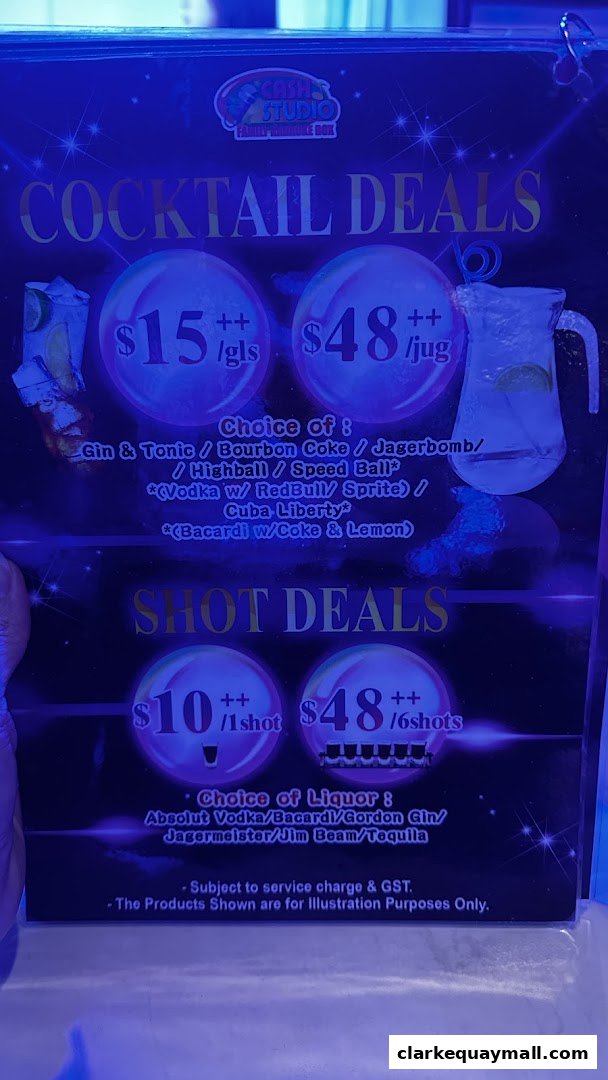 A menu board displaying cocktail and shot deals with prices and drink choices.