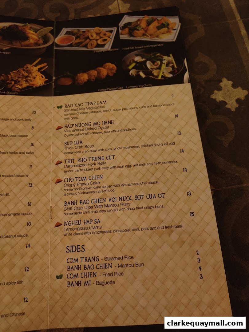 A menu from Little Saigon featuring Vietnamese dishes and sides with prices.