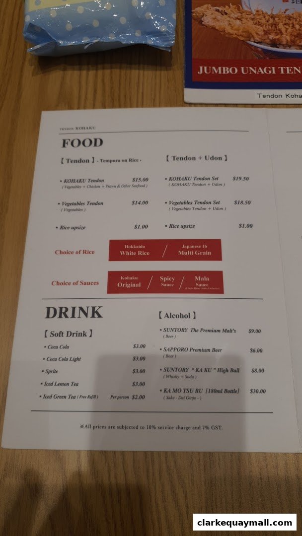 A menu from Tendon Kohaku featuring food and drink options, including various tendon dishes and beverages.