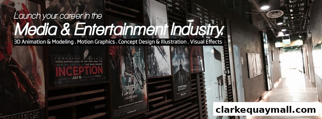 A hallway with movie posters and text promoting a media and entertainment industry school.
