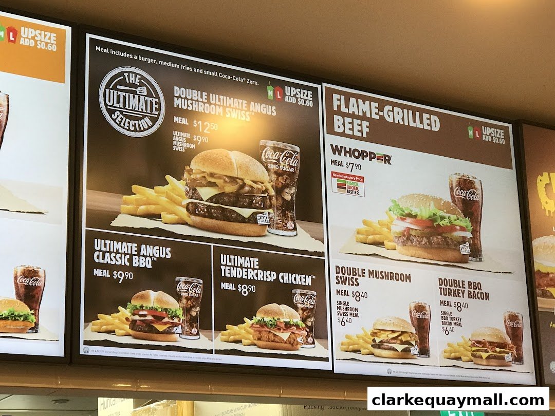 A menu board displaying various Burger King meals, including burgers, fries, and drinks.