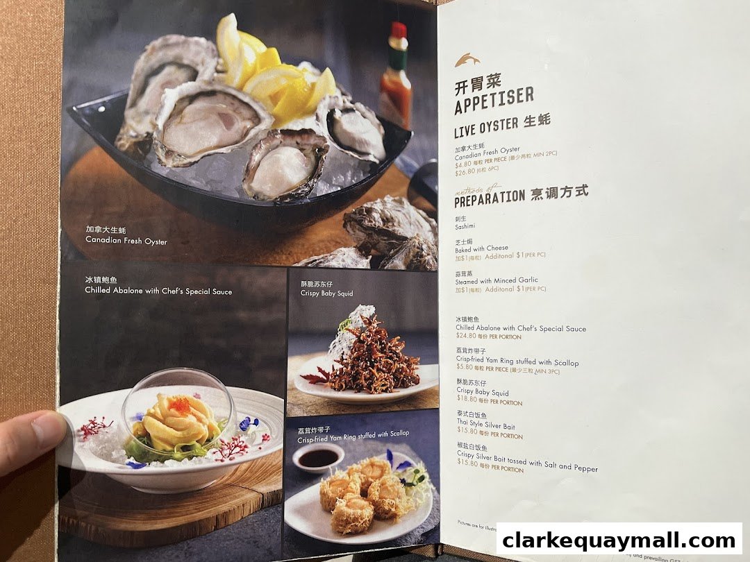 A menu featuring fresh oysters, abalone, squid, and other seafood appetizers with prices.