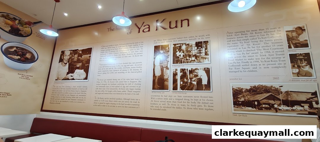 A wall display detailing the history of Ya Kun Kaya Toast with vintage photos and text.