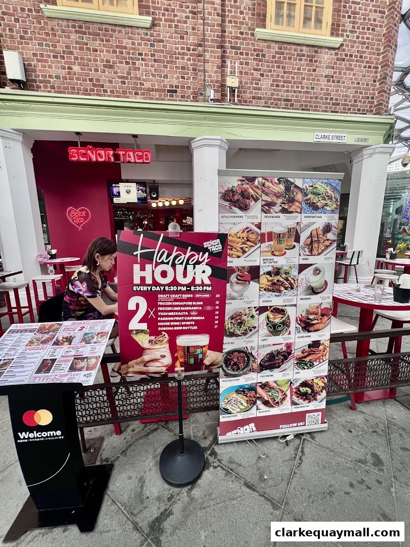 Señor Taco Clarke Quay storefront with a happy hour promotion and menu displays.