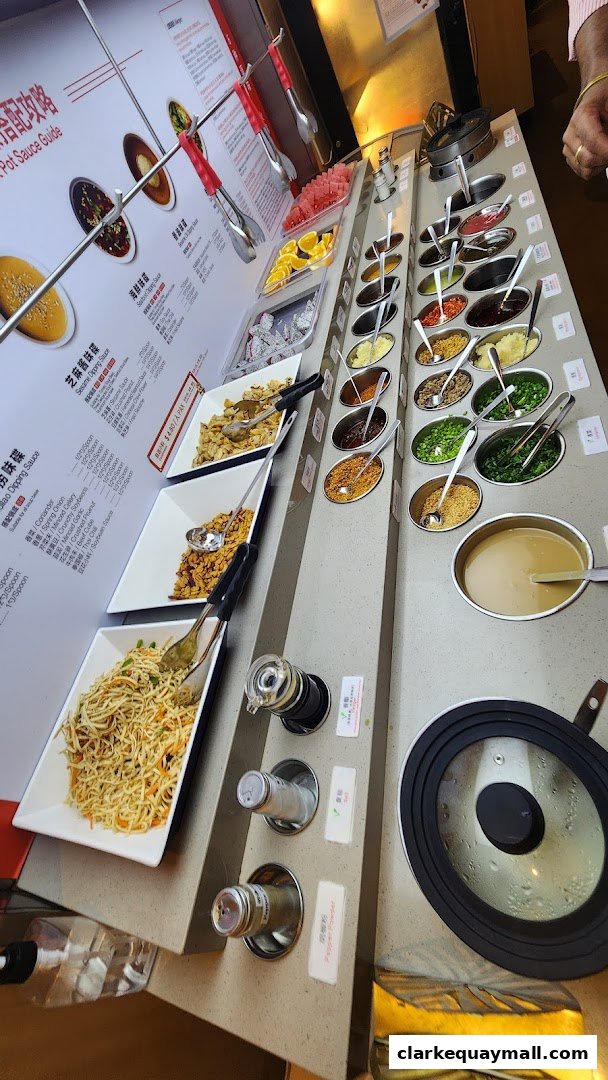 A selection of hot pot ingredients and sauces displayed for customers.