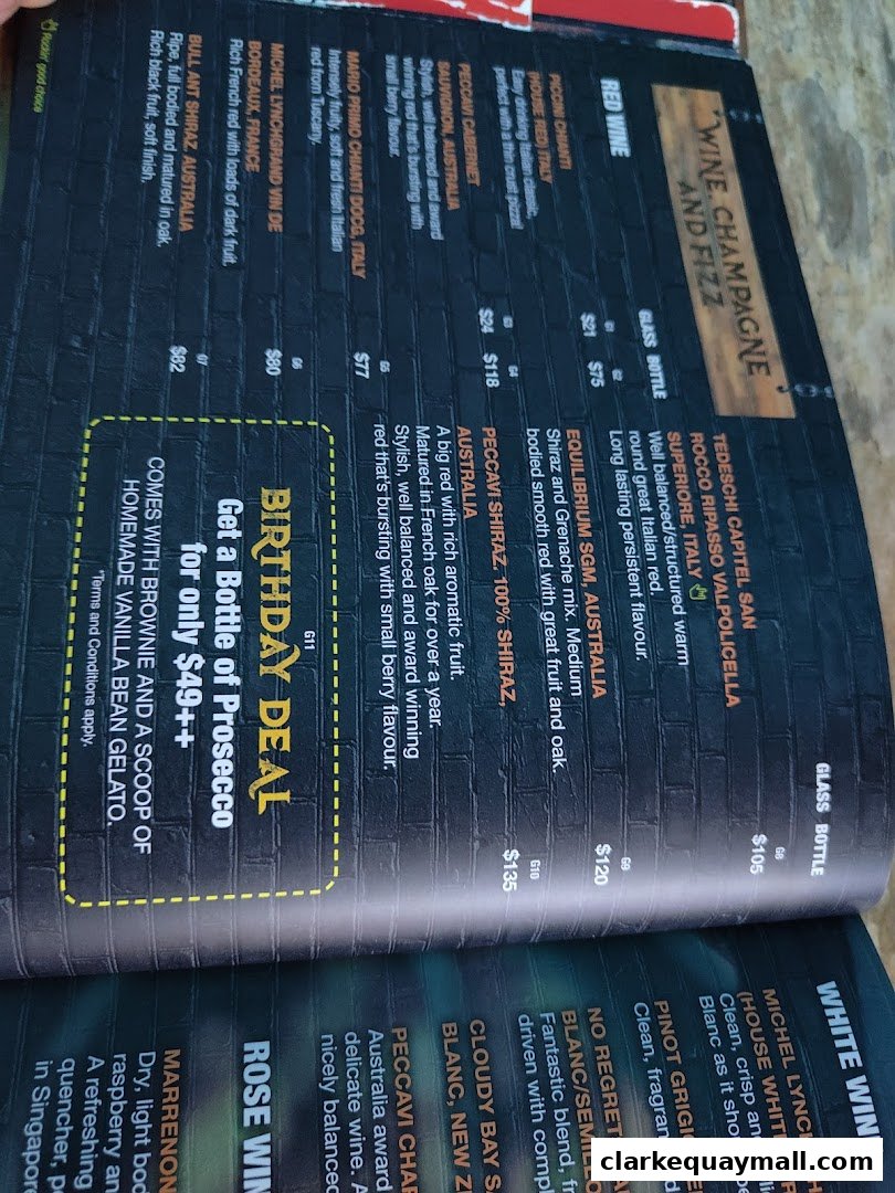 A menu page featuring wine selections and a birthday deal.