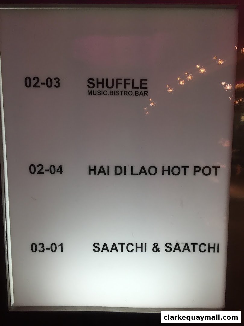A sign listing various shops and their unit numbers, including Haidilao Hot Pot.