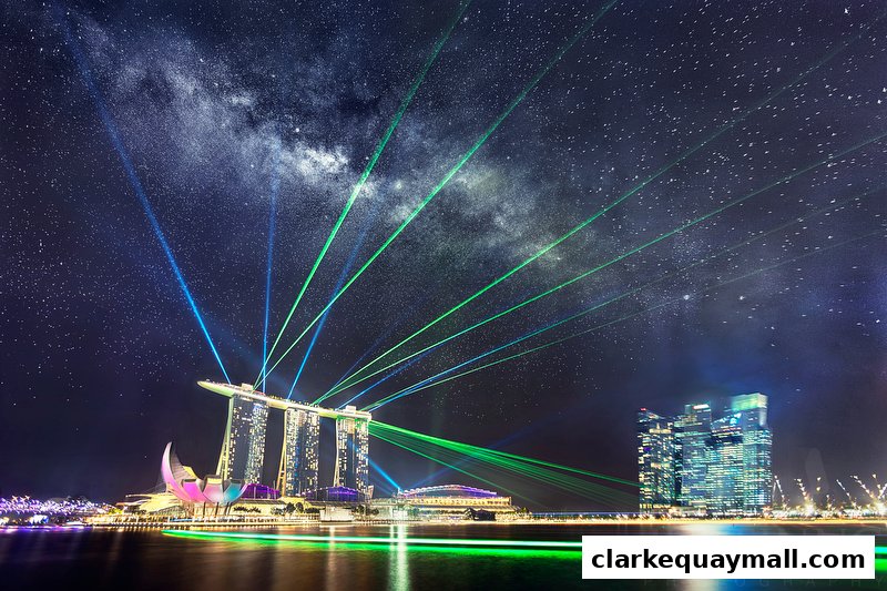 A stunning night view of Marina Bay Sands with laser light show under the Milky Way.