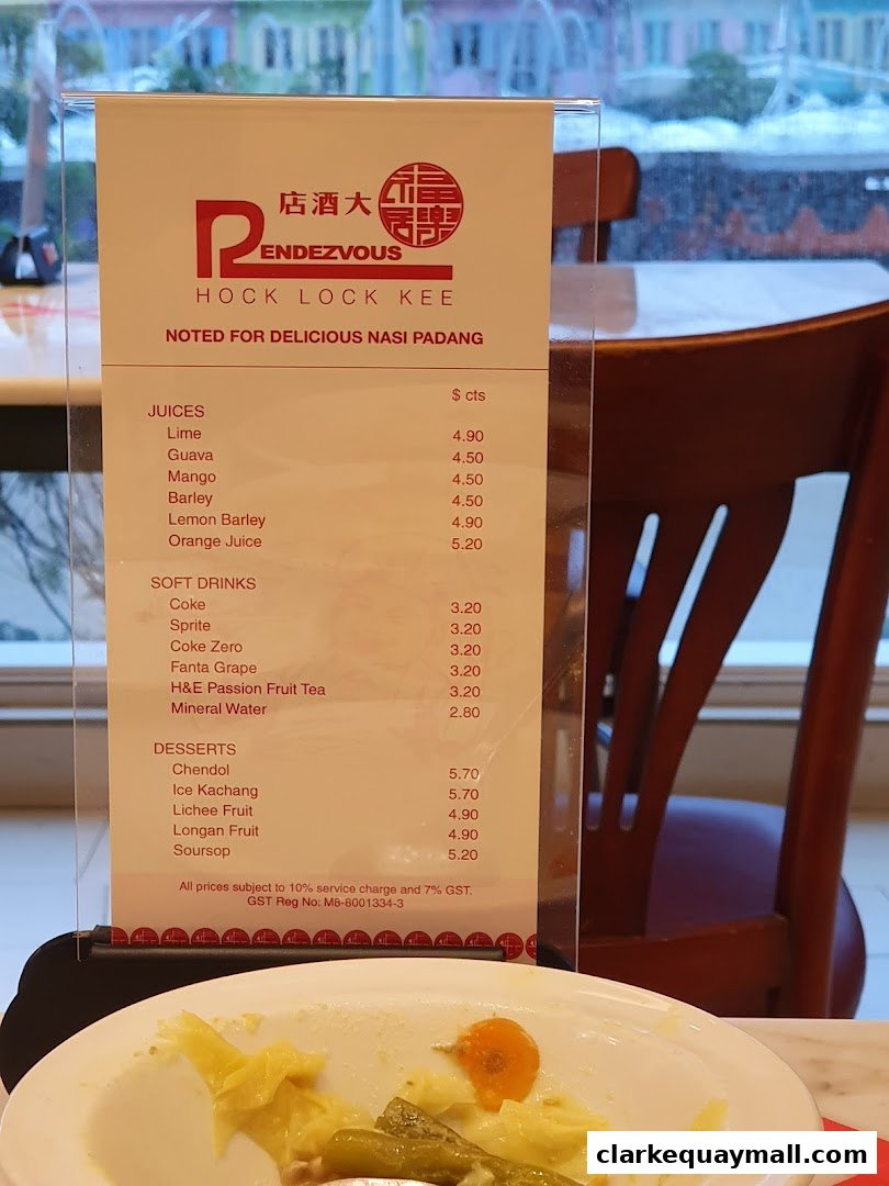 A menu from Rendezvous Restaurant Hock Lock Kee, featuring juices, soft drinks, and desserts.