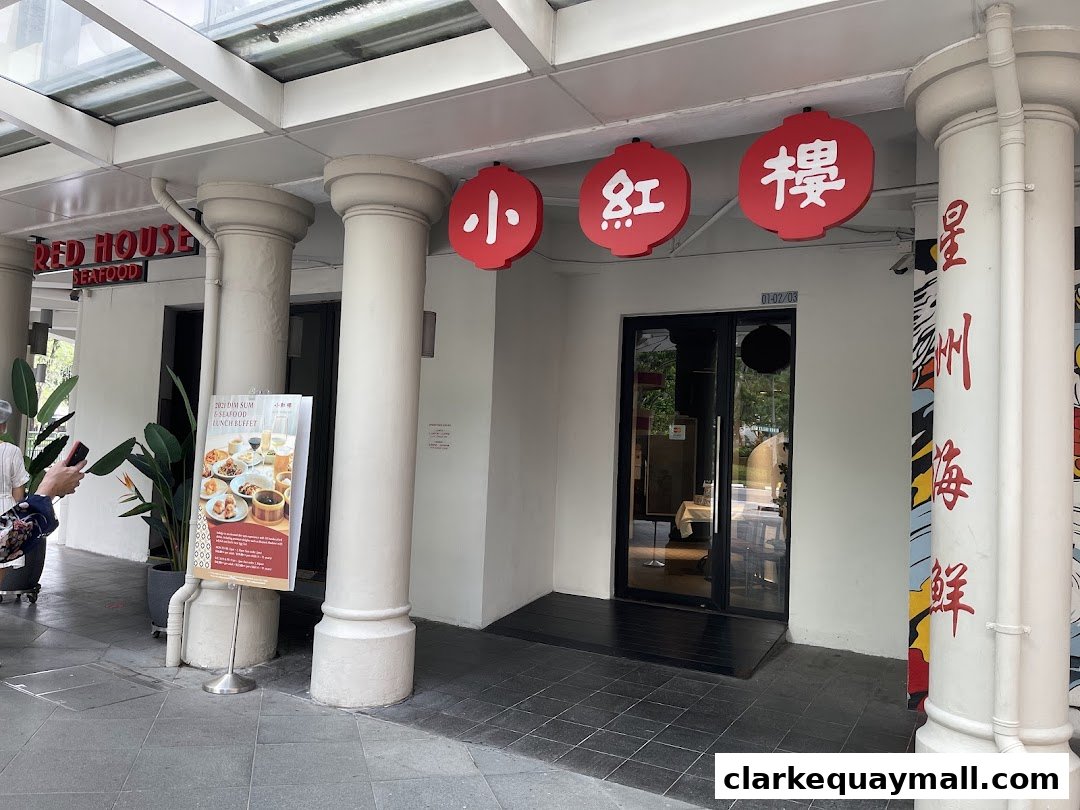 The entrance of Red House Seafood Nanyang Clarke Quay with a lunch buffet sign.