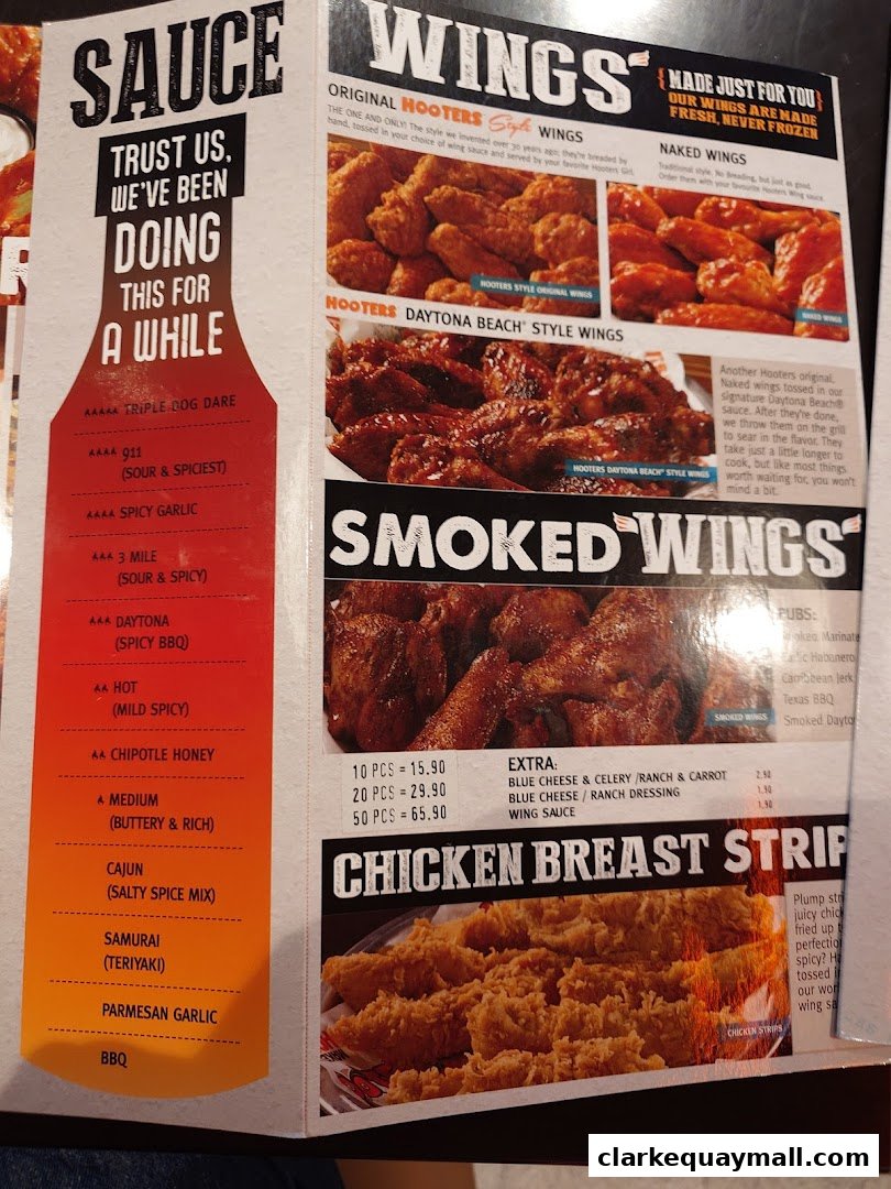 A menu page from Hooters featuring various wing flavors and chicken breast strips.