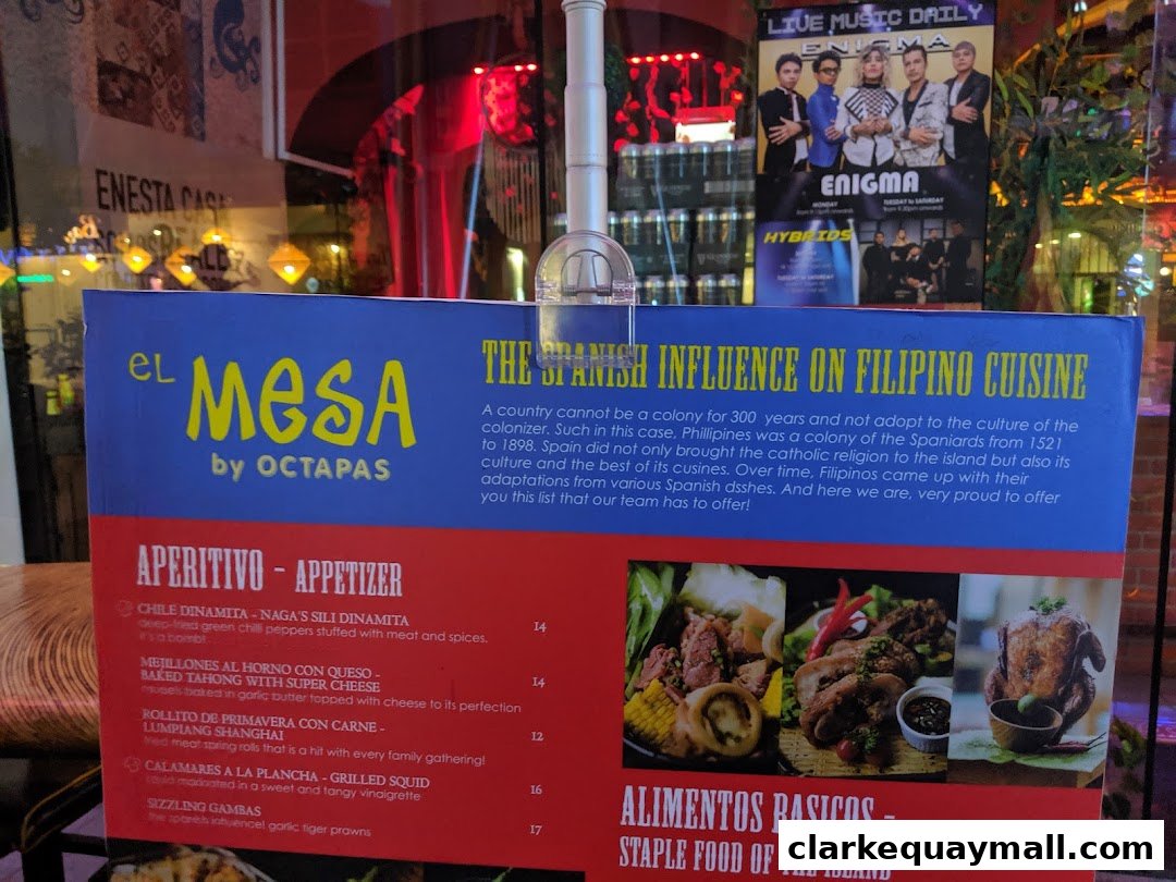 A menu for El Mesa Filipino Seafood Grill, highlighting Spanish influence on Filipino cuisine.