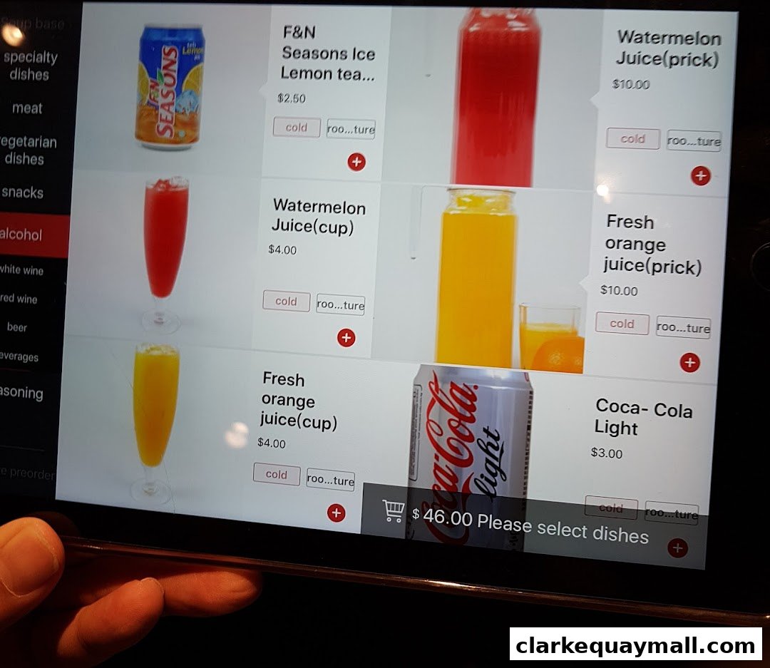 A digital menu displaying various drinks and their prices at Haidilao Hot Pot.