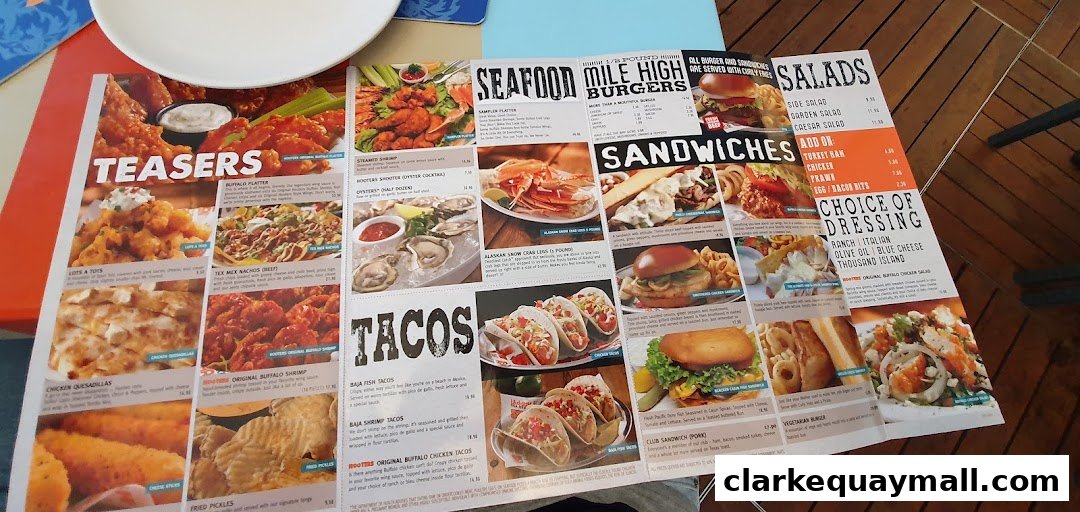 A Hooters menu featuring various food items like wings, seafood, burgers, sandwiches, tacos, and salads.