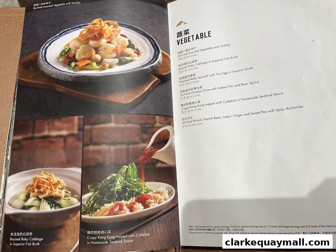 A menu page from Seafood Paradise featuring vegetable dishes with appealing food photography.