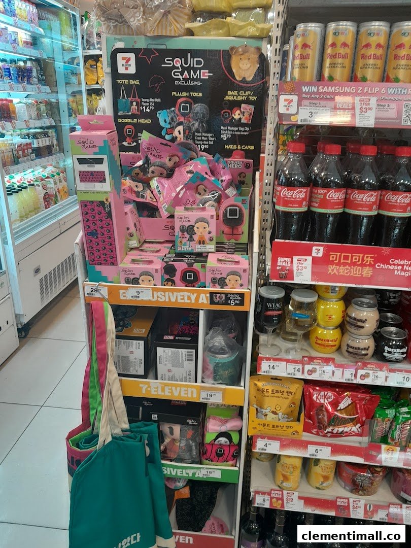 An in-store display at 7-Eleven featuring exclusive Squid Game merchandise alongside beverages and snacks.