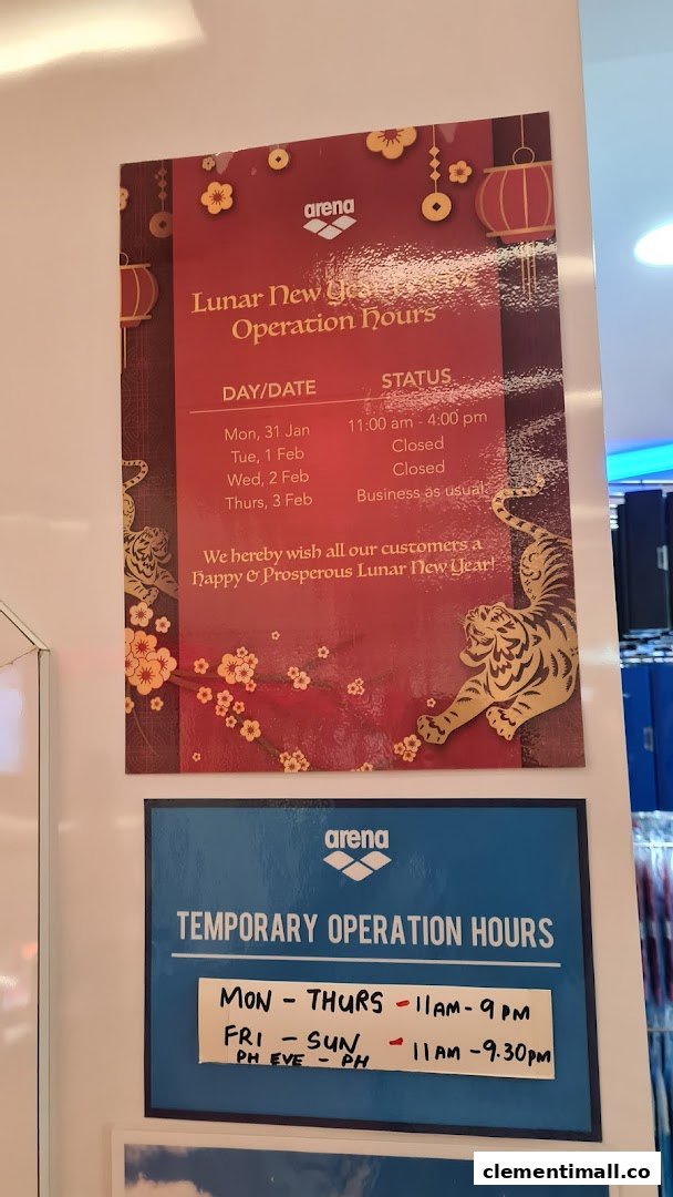 Signs displaying Arena's Lunar New Year and temporary operating hours.