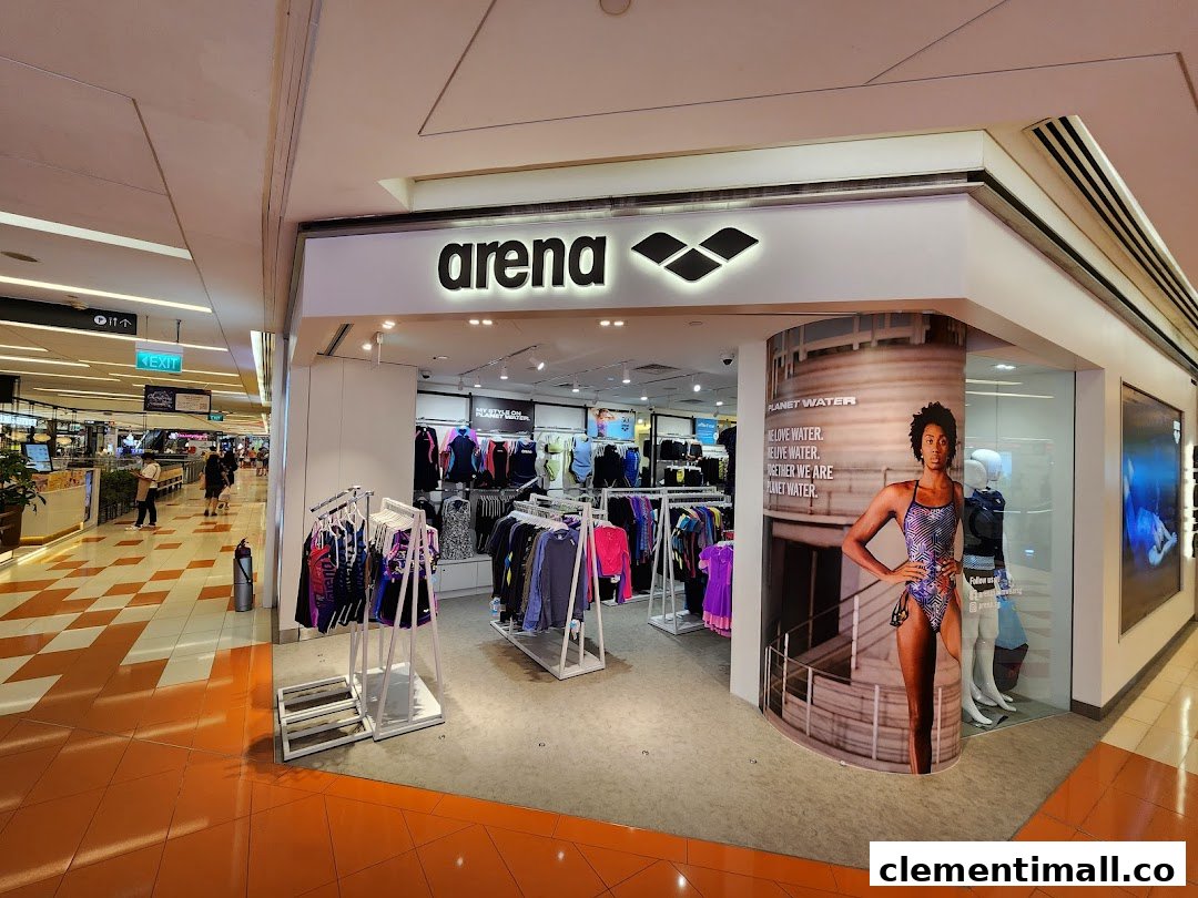 The Arena shopfront showcases a wide range of swimwear and aquatic sports apparel in a vibrant mall setting.
