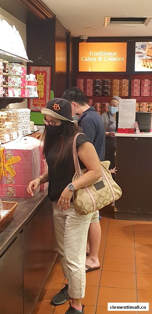 Customers browse traditional cakes and cookies at Bengawan Solo, a shop specializing in Indonesian delicacies.