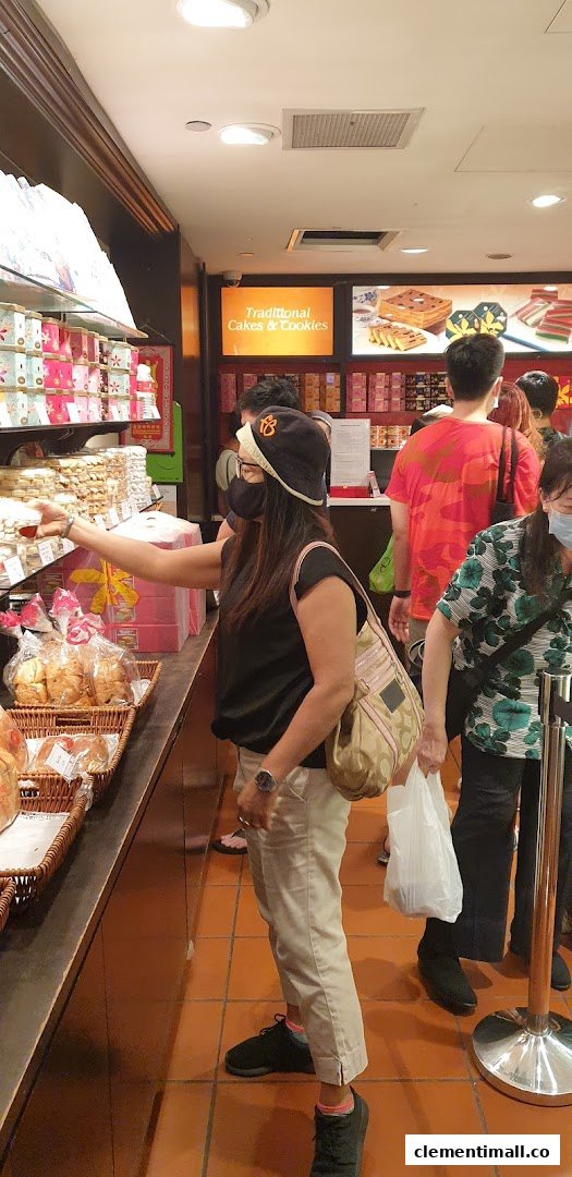Customers browse shelves filled with traditional cakes and cookies at Bengawan Solo bakery.