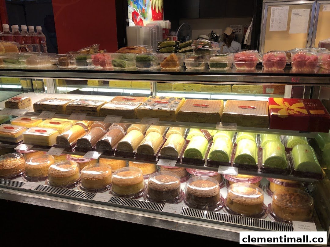 A vibrant display case filled with a variety of traditional Indonesian cakes and pastries at Bengawan Solo.