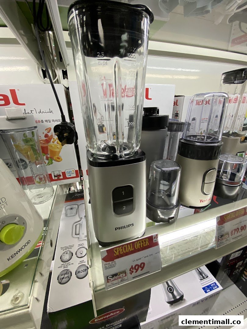 Close-up of blenders and kitchen appliances on display shelves, featuring a Philips blender on special offer.