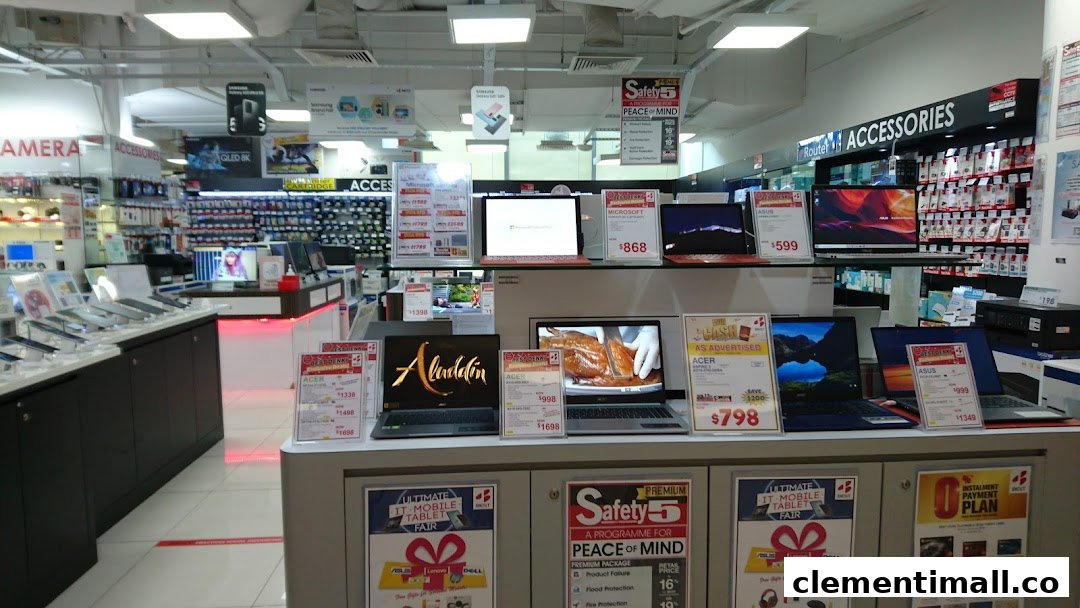 Interior of Best Denki showcasing a wide array of laptops, tablets, and electronic accessories.