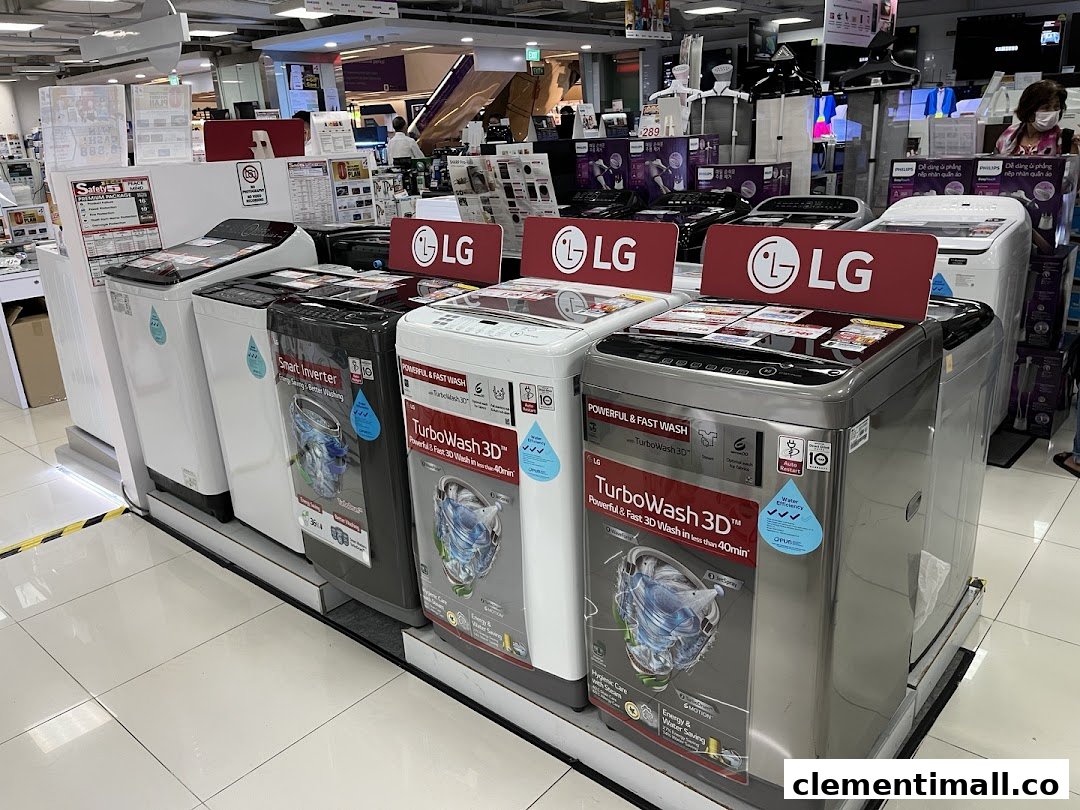 A display of LG washing machines inside Best Denki, showcasing various models and features.