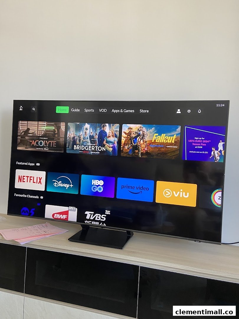 A smart TV screen displaying popular streaming apps like Netflix, Disney+, and Prime Video.
