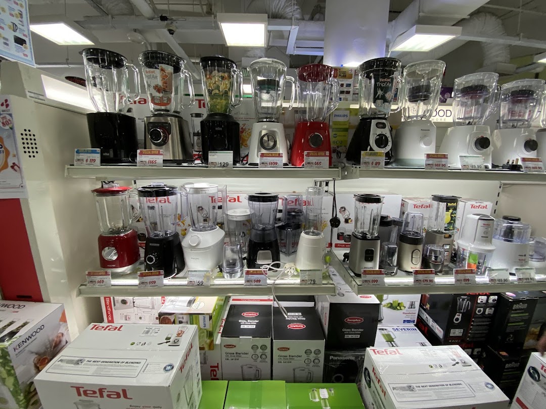 A retail display showcasing a wide variety of blenders and small kitchen appliances on shelves.