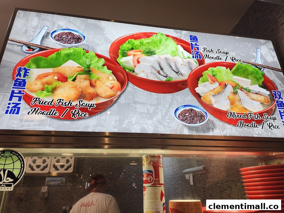 A vibrant display board showcasing various delicious fish soup options available at the eatery.