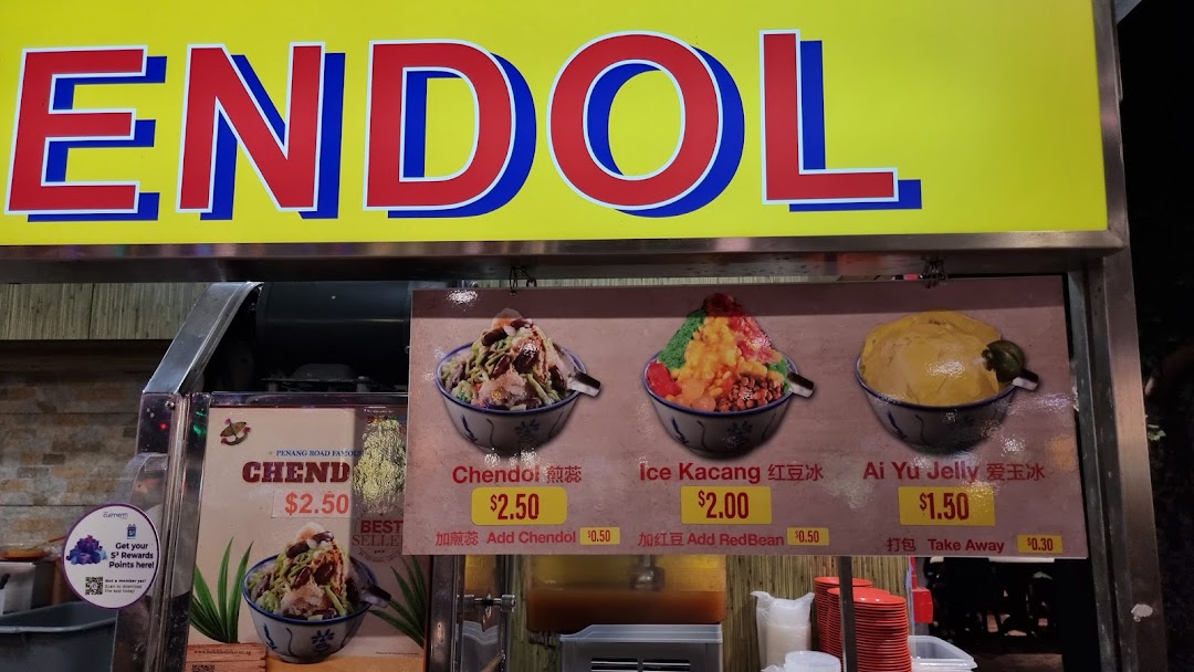 A vibrant menu board showcasing various traditional iced desserts like Chendol and Ice Kacang.