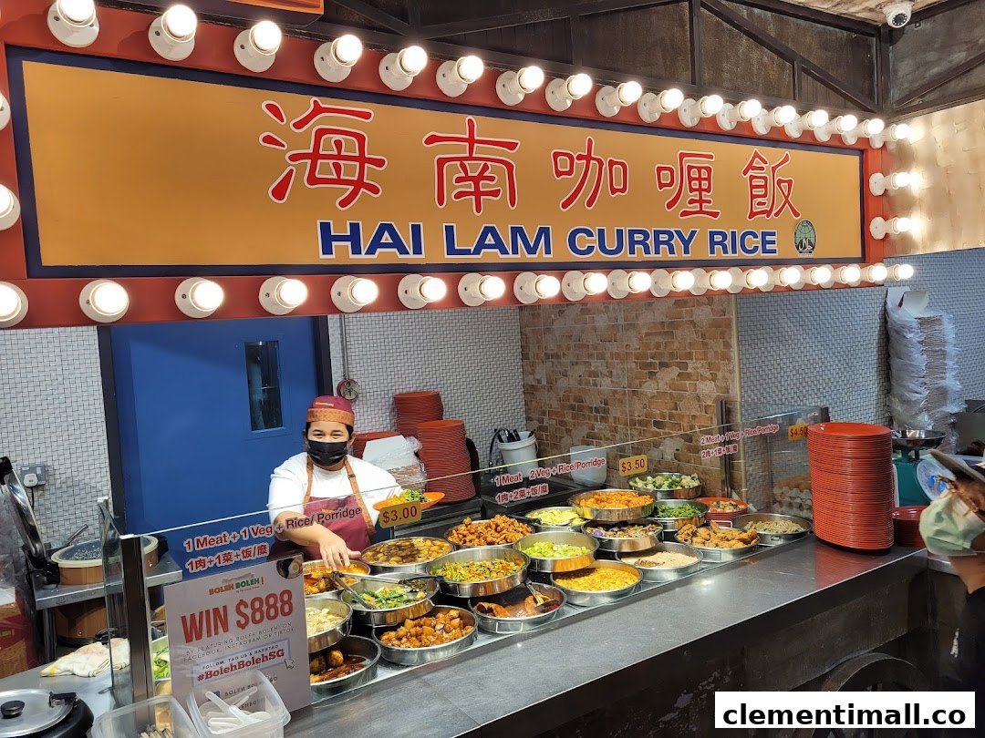 A vibrant food stall at Boleh Boleh! Clementi Mall showcasing a variety of Hai Lam Curry Rice dishes.