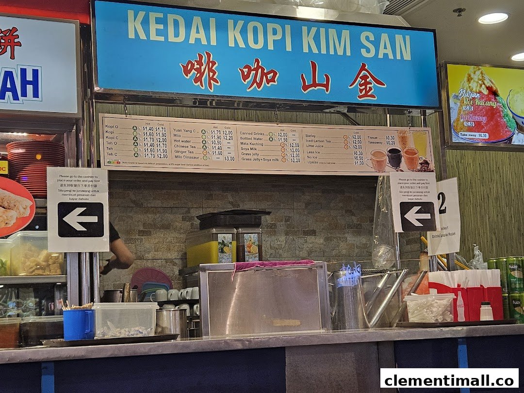 A food stall counter with a prominent menu board displaying traditional drinks and desserts.
