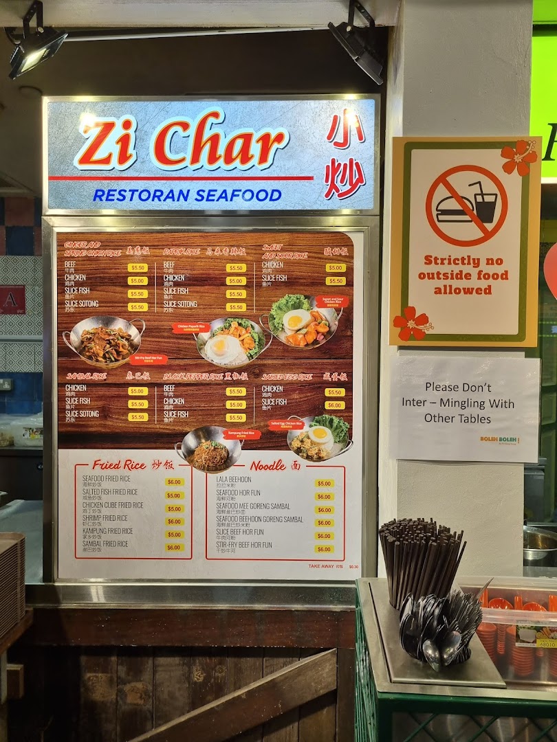 A menu board for Zi Char Restoran Seafood, displaying various rice and noodle dishes with prices.