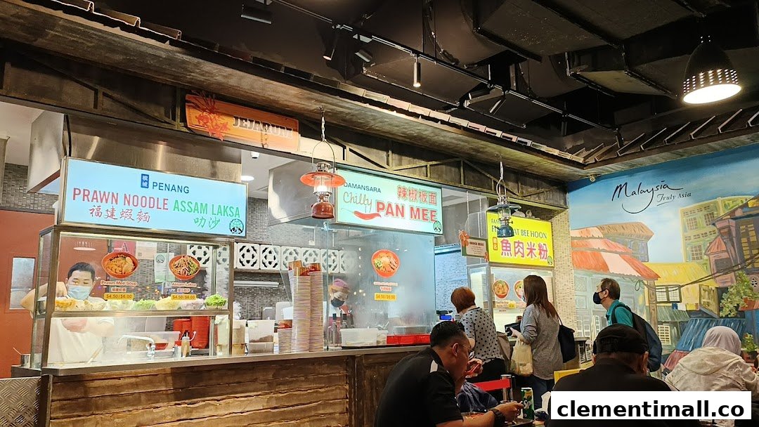 A bustling food stall at Boleh Boleh! Clementi Mall, serving Malaysian hawker delights like Prawn Noodle and Pan Mee.