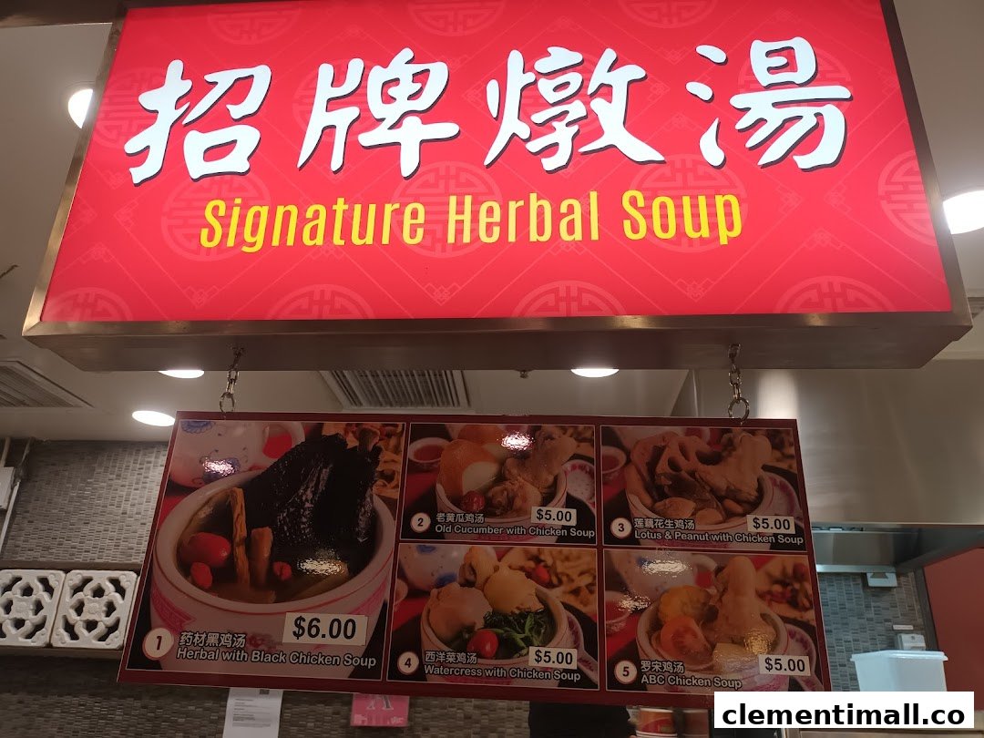A menu board displaying various signature herbal and chicken soups with prices at Boleh Boleh! Clementi Mall.