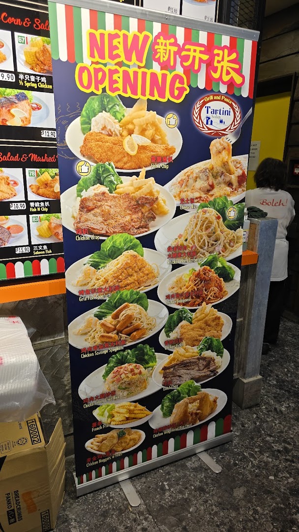 A promotional banner for 'Tartini' at Boleh Boleh! featuring various grilled dishes and pasta.