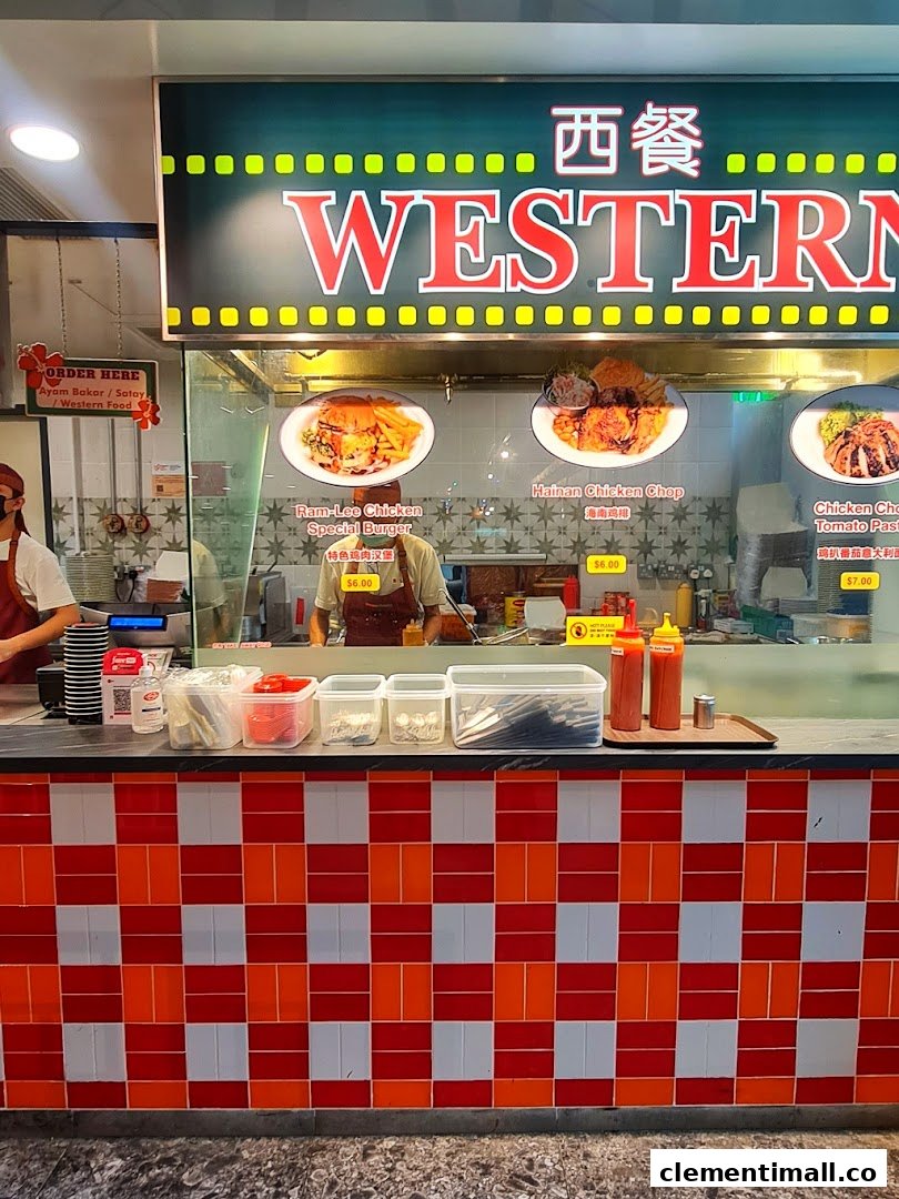 A food stall counter named 'Western' displaying various chicken and burger dishes with prices.