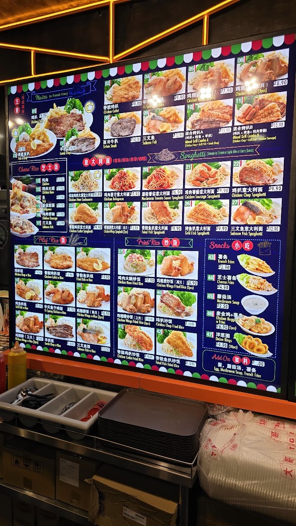 A vibrant digital menu board displaying a wide array of Western and Asian fusion dishes with prices.
